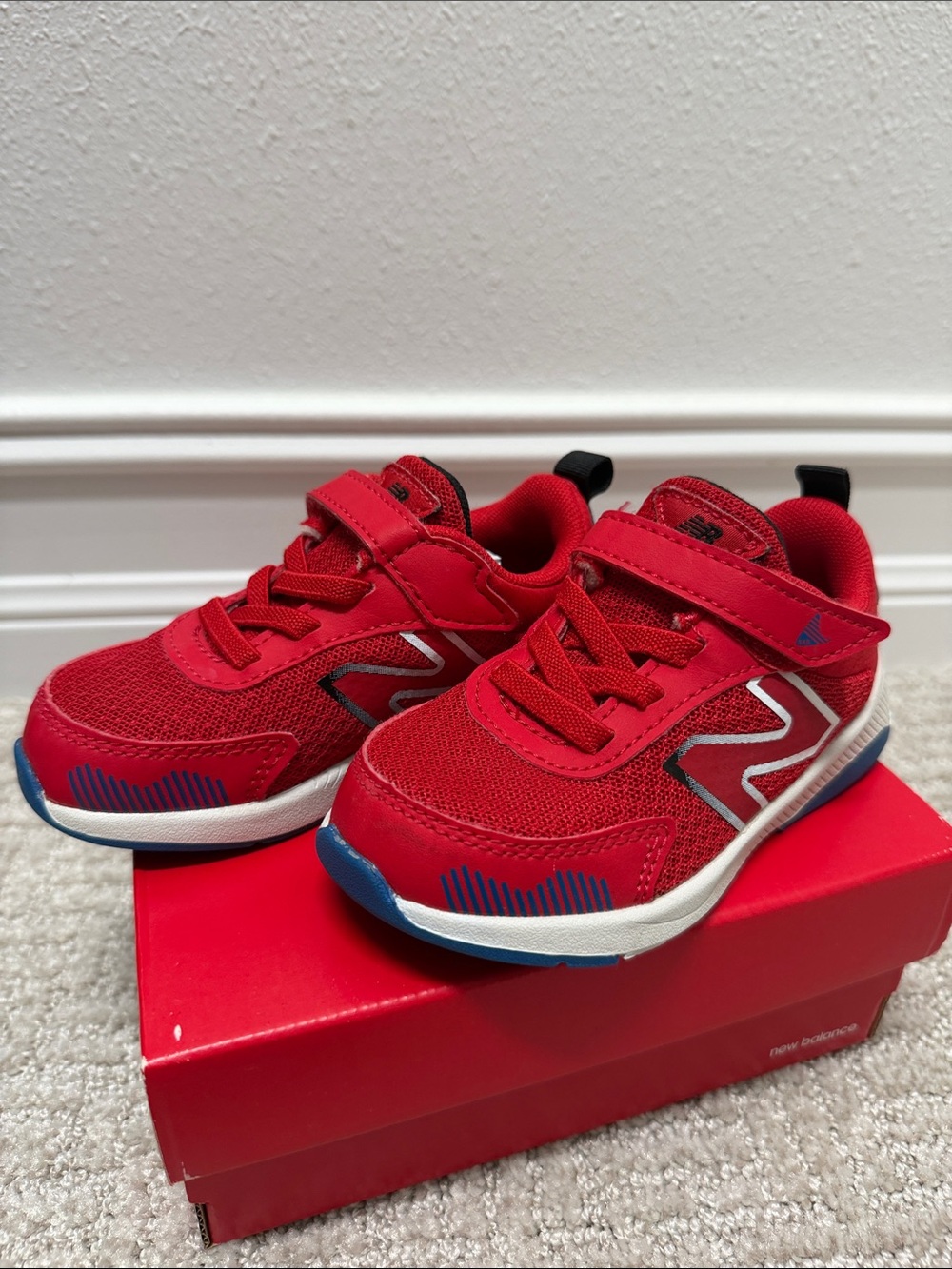 New Balance Red Kids Sneakers with Blue Accents